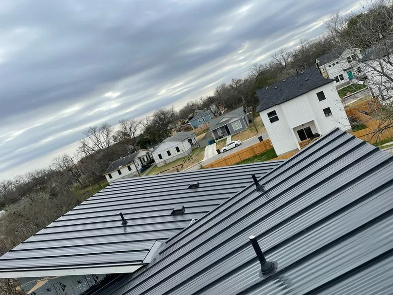 Standing seam metal roof panels with vents for Skylight Repair in Cumming